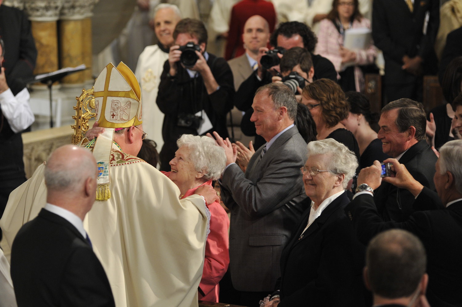 Then-Archbishop Timothy M. Dolan greets his proud mother, Shirley Dolan, at the beginning of his Installation Mass as Archbishop of New York April 15, 2009 at St. Patrick's Cathedral.